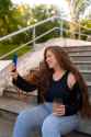 side-view-woman-taking-selfie_23-2151047860.jpg