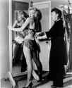 marilyn-monroe-gets-ready-for-scene-on-her-showgirl-costume-v0-vdlo44symi6h1.png