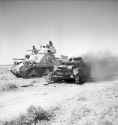 M3_Grant_with_knocked_out_Panzer_I_1942.jpg