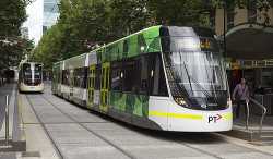 E_6001_and_E_6002_(Melbourne_trams)_in_Bourke_St_on_route_96,_2013.jpg