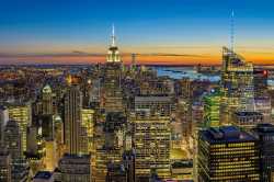 1280px-Lights_of_Rockefeller_Center_during_sunset[1].jpg