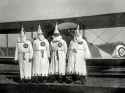 kkk-members-and-airplane.jpg
